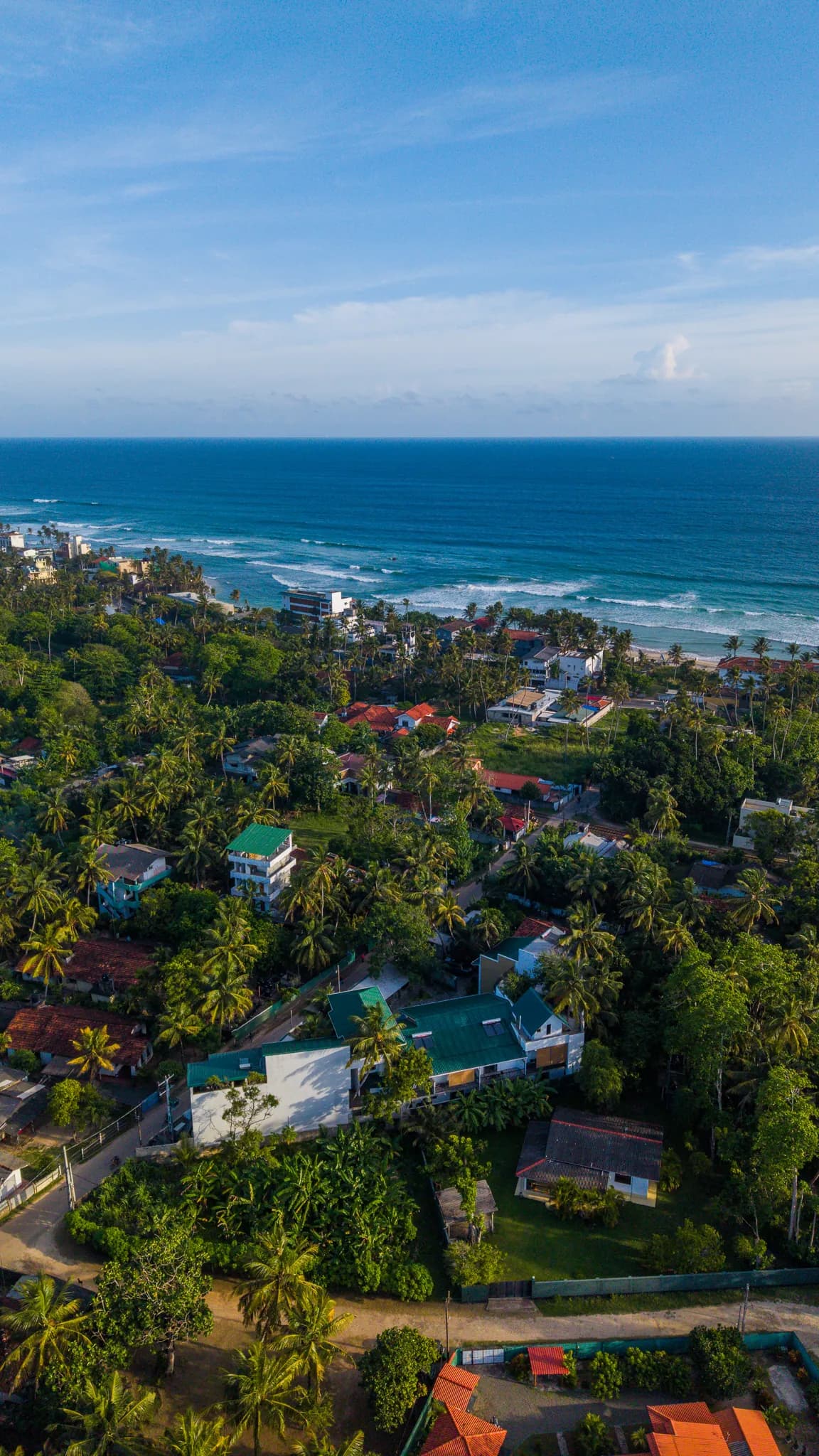 Aerial view of the Ahangama coastline and village from above the hotel