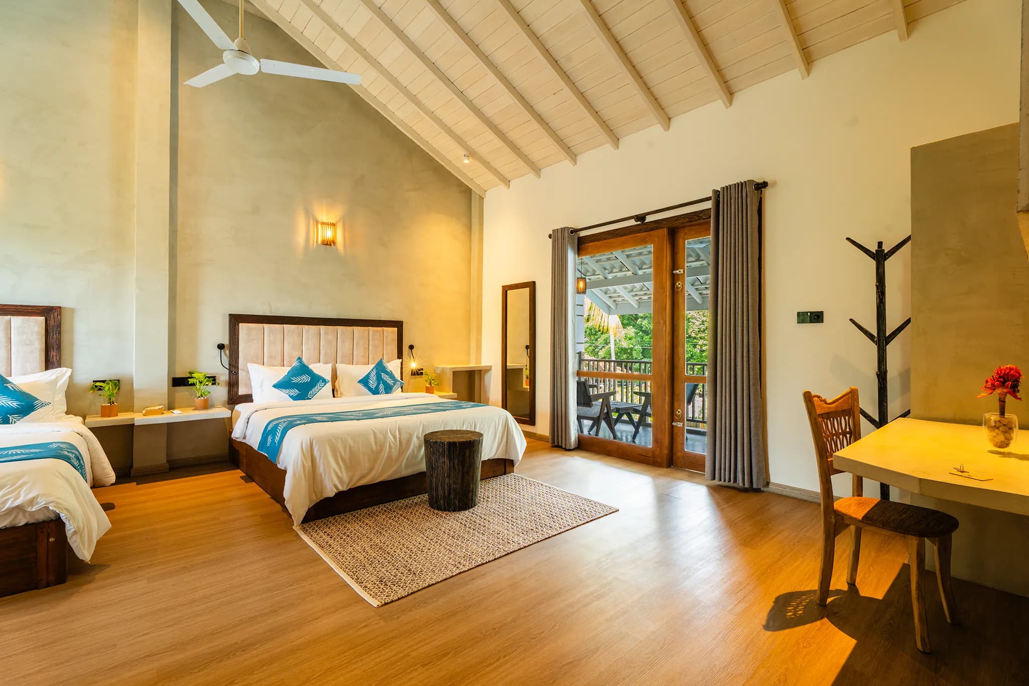 Family suite with desk and balcony doors