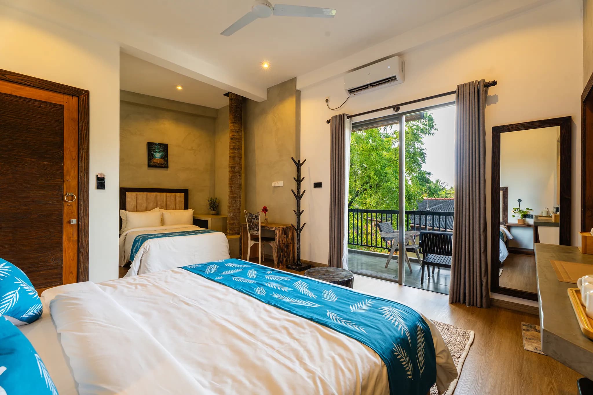 King bedroom with a second sleeping alcove beyond