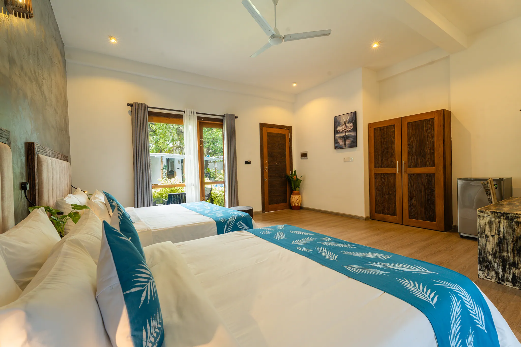 Detail of bed linen and cushions in the family suite