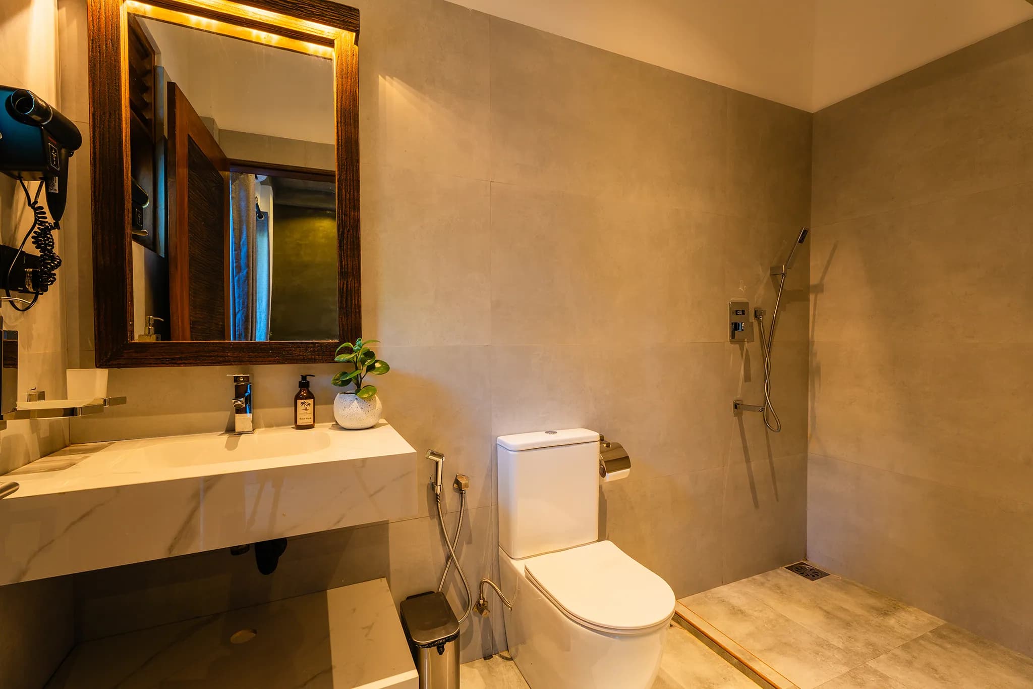 Concrete-finish bathroom with basin and mirror