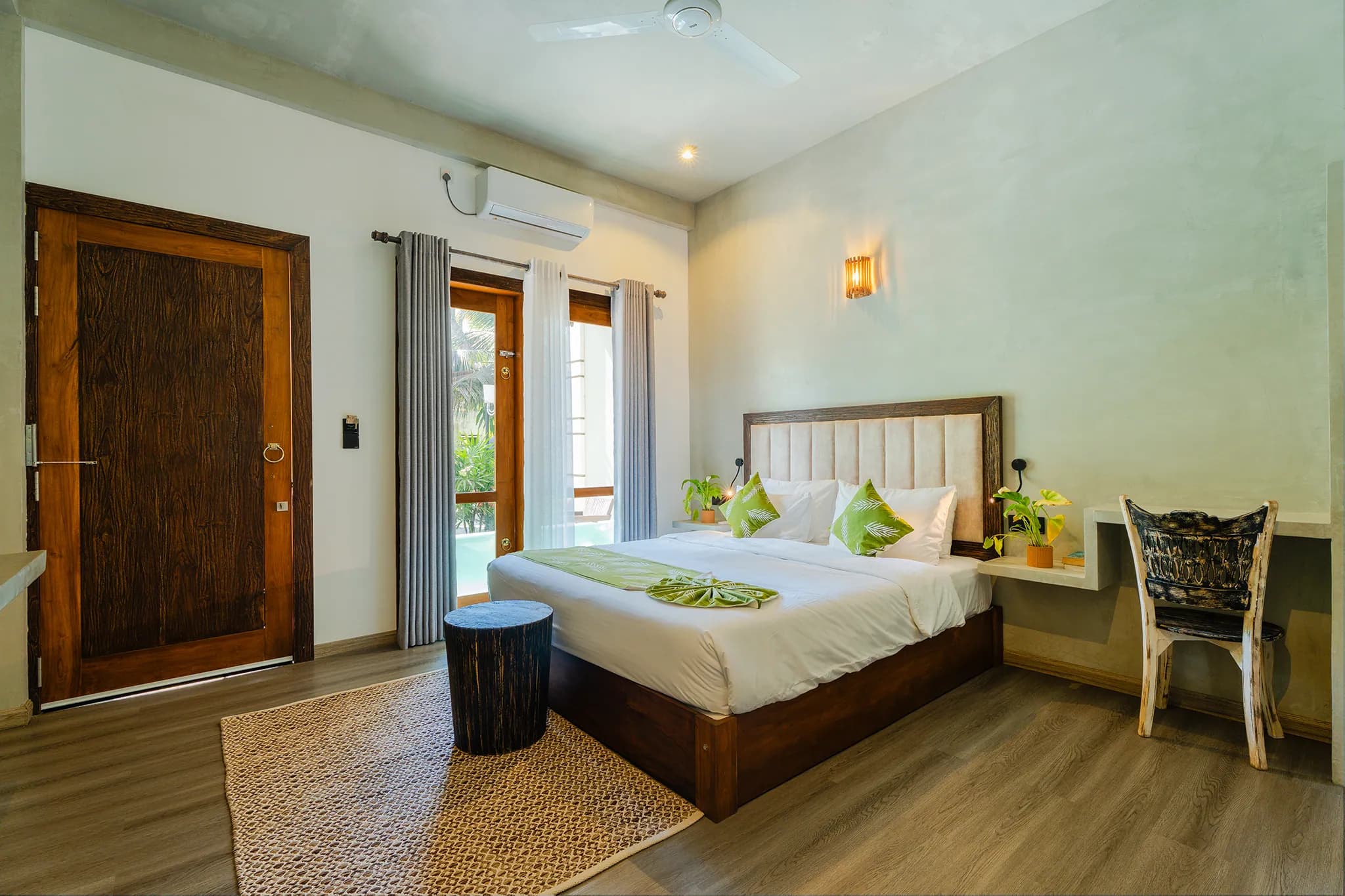 King room with desk and timber entrance door